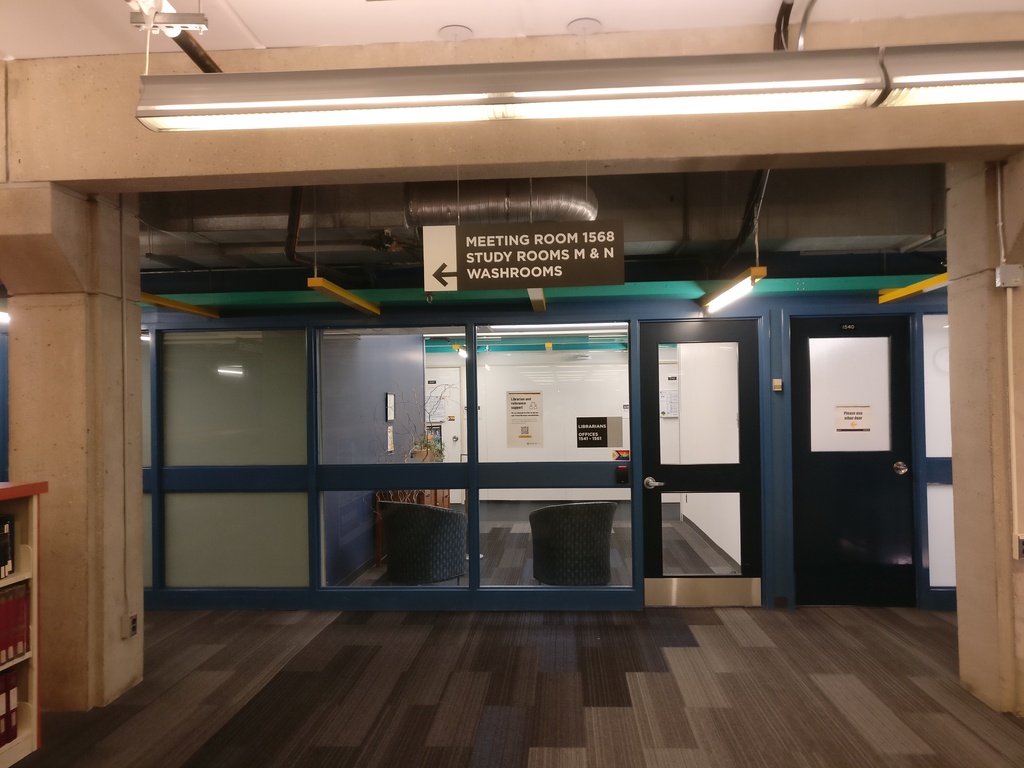 Corridor with sign pointing to DC 1568